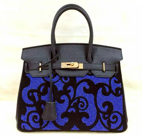 Blue tote with black scroll design